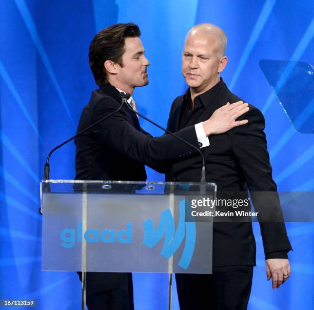 Actor Matt Bomer presents creator Ryan Murphy with the Outstanding Comedy Series award for "The New Normal" onstage during the 24th Annual GLAAD...