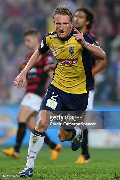 Daniel McBreen of the Mariners celebrates kicking a penalty goal during the A-League 2013 Grand Final match between the Western Sydney Wanderers and...