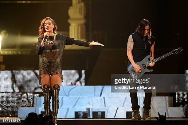 Rihanna and Nuno Bettencourt perform at BB&T Center on April 20, 2013 in Sunrise, Florida.