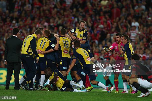 The Mariners celebrate after they defeated the Wanderers during the A-League 2013 Grand Final match between the Western Sydney Wanderers and the...