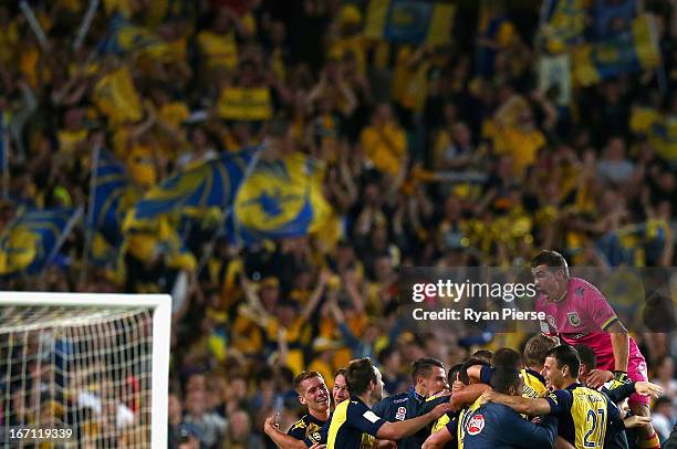 Mathew Ryan of the Mariners celebrates victory after during the A-League 2013 Grand Final match between the Western Sydney Wanderers and the Central...