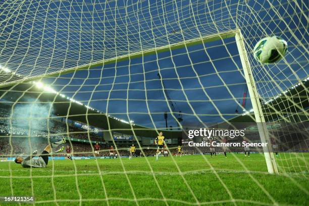 Daniel McBreen of the Mariners kicks a penalty goal past Wanderers goal keeper Ante Covic during the A-League 2013 Grand Final match between the...