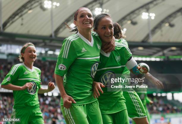 Nadine Kessler of Wolfsburg celebrates with her team mates after scoring her team's second goal during the Women's Champions League semi-final second...