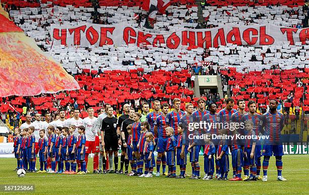 Moscow and FC Spartak Moscow players line up during the national anthem before the start the Russian Premier League match between PFC CSKA Moscow and...