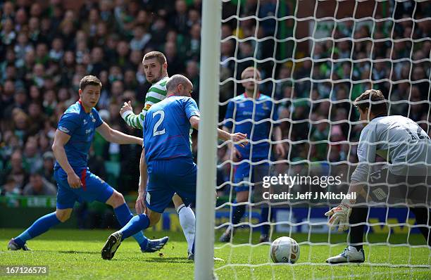 Gary Hooper of Celtic scores his second goal and his team's third goal past Antonio Reguero of Inverness Caledonian Thistle the Clydesdale Bank...