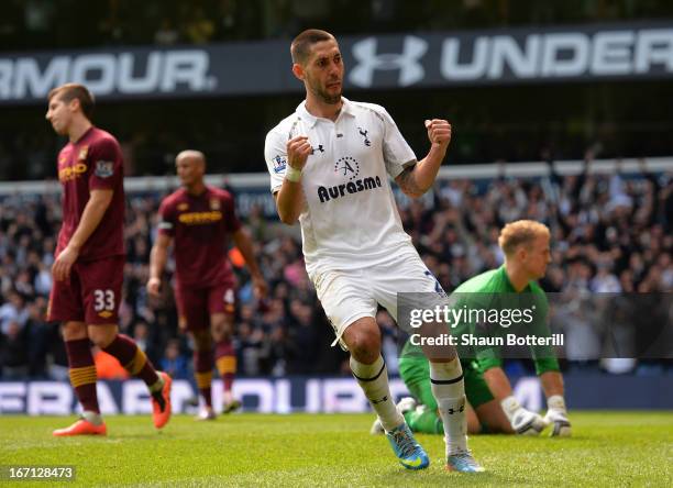 Clint Dempsey of Tottenham Hotspur celebrates scoring their first goal during the Barclays Premier League match between Tottenham Hotspur and...