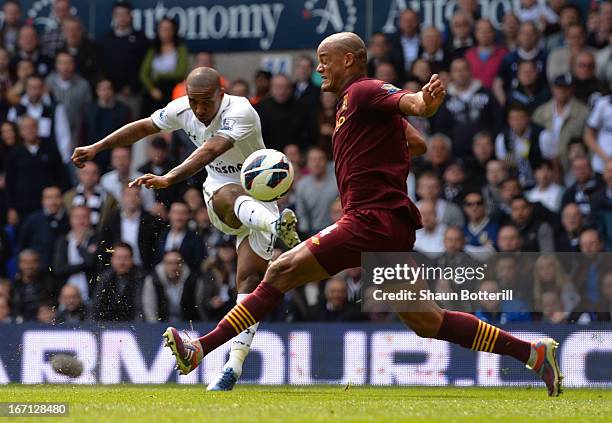 Vincent Kompany of Manchester City fails to stop Jermain Defoe of Tottenham Hotspur scoring their second goal during the Barclays Premier League...