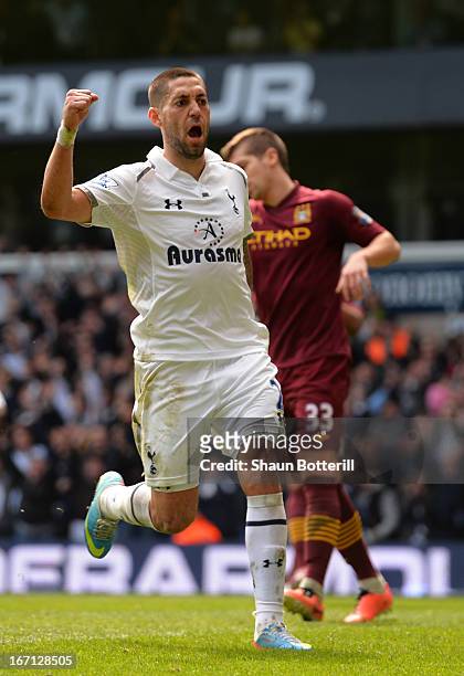 Clint Dempsey of Tottenham Hotspur celebrates scoring their first goal during the Barclays Premier League match between Tottenham Hotspur and...