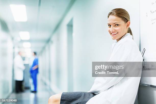 young female doctor in hospital - hhp5 stock pictures, royalty-free photos & images