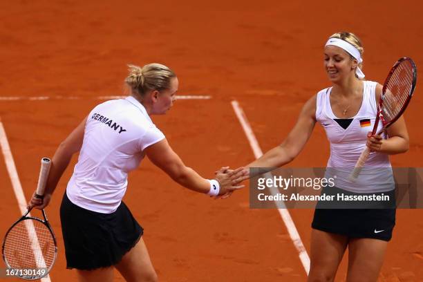 Anna-Lena Groenefeld of Germany celebrates with her team mate Sabine Lisicki during her double match against Aleksandra Krunic and Vesna Dolonc of...