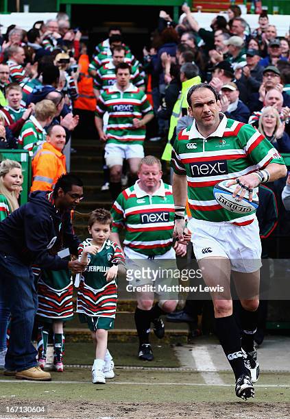 Martin Johnson leads his team out during the Leicester Tigers Legends Match between Louis Deacon's Tigers and Matt Hampson International Legends at...