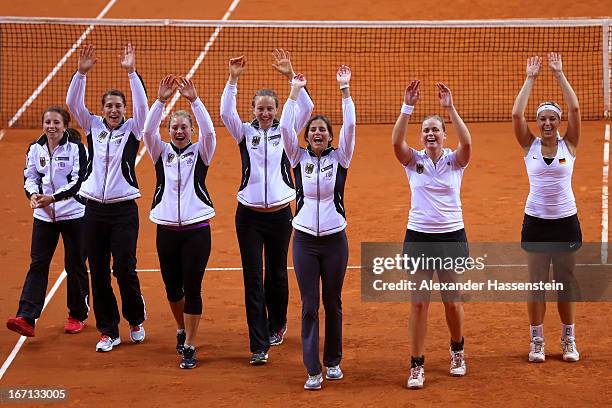 Annika Beck, Andrea Petkovic, Angelique Kerber, Mona Barthel, Julia Goerges, Anna-Lena Groenefeld, and Sabine Lisicki ofGermany celebrate victory...