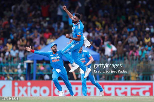 Mohammad Siraj celebrates after taking the wicket of Charith Asalanka during the Asia Cup Final match between India and Sri Lanka at R. Premadasa...