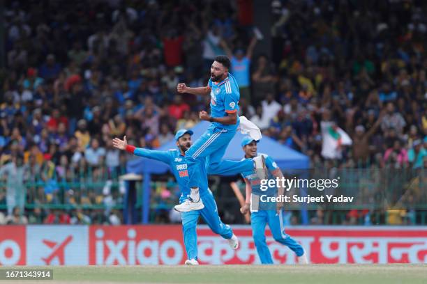 Mohammad Siraj celebrates after taking the wicket of Charith Asalanka during the Asia Cup Final match between India and Sri Lanka at R. Premadasa...