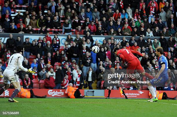 Luis Suarez of Liverpool scores the second goal for Liverpool to make it 2-2 during the Barclays Premier League match between Liverpool and Chelsea...