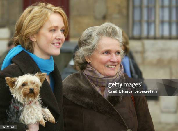 French actresses Fanny Cottencon and Marie Christine Barrault attend the funeral services for French actor Daniel Gelin December 4, 2002 in Paris....