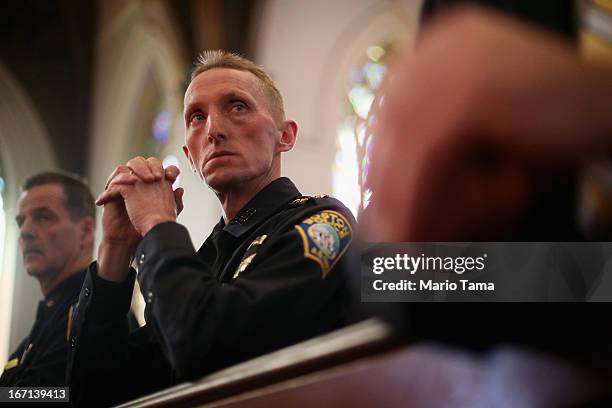 Boston Police Department Superintendent William Evans and Kevin Buckley attend mass at the Cathedral of the Holy Cross on the first Sunday after the...