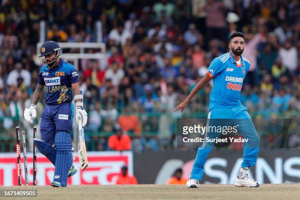 Mohammed Siraj celebrates after taking the wicket of Kusal Mendis during the Asia Cup Final match between India and Sri Lanka at R. Premadasa Stadium...