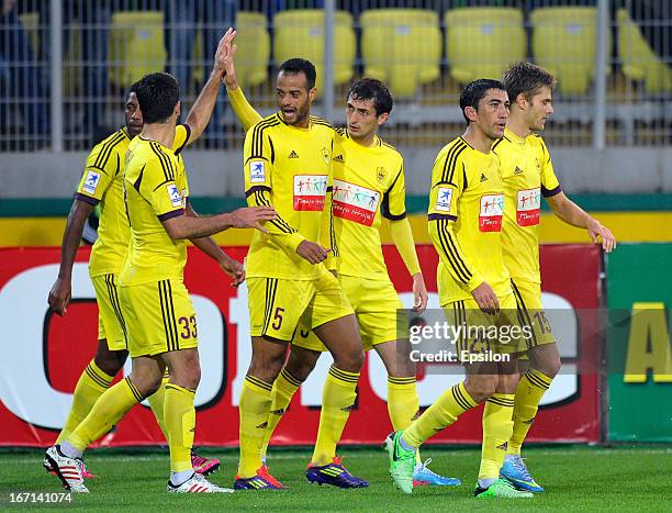 Anzhi Makhachkala players celebrate after a goal is scored for their team during the Russian Premier League match between FC Anzhi Makhachkala and FC...
