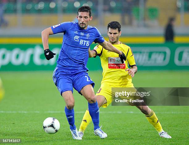 Kevin Kuranyi of FC Dynamo Moscow and Emir Spahic of FC Anzhi Makhachkala vie for the ball during the Russian Premier League match between FC Anzhi...