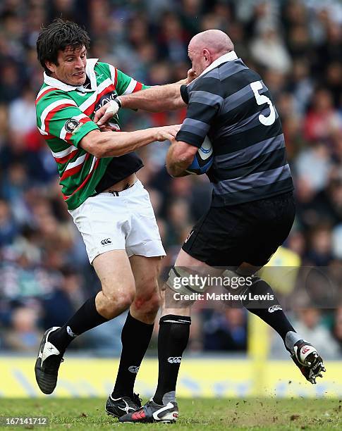 Martin Corry of Louis Deacon's Tigers tackles Trevor Brennan of Matt Hampson International Legends during the Leicester Tigers Legends Match between...