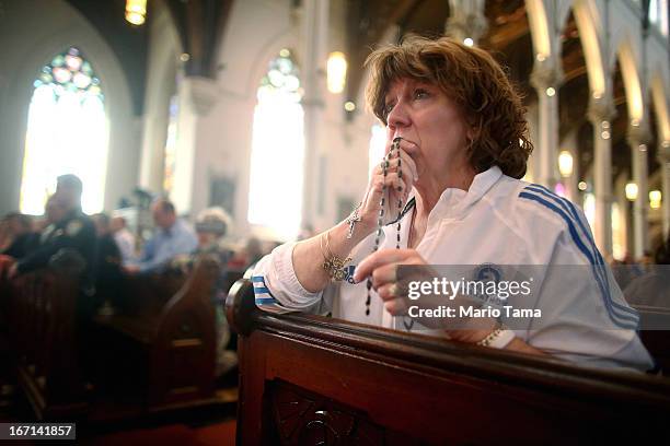 Nurse practitioner Maureen Quaranto , who treated victims of the Boston Marathon bombings in Tent A, wears her Boston Marathon jacket during Mass at...