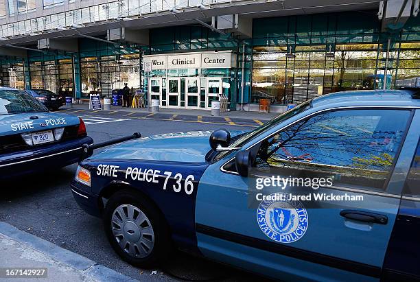 Boston Police and Massachusetts State Police stand guard outside of Beth Israel Deaconess Medical Center, where the Boston Marathon bombing suspect,...