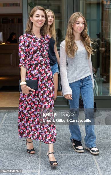 Filmmaker Sofia Coppola and daughters Romy Mars and Cosima Mars are seen leaving the Anna Sui SS 2024 fashion show during New York Fashion Week at...