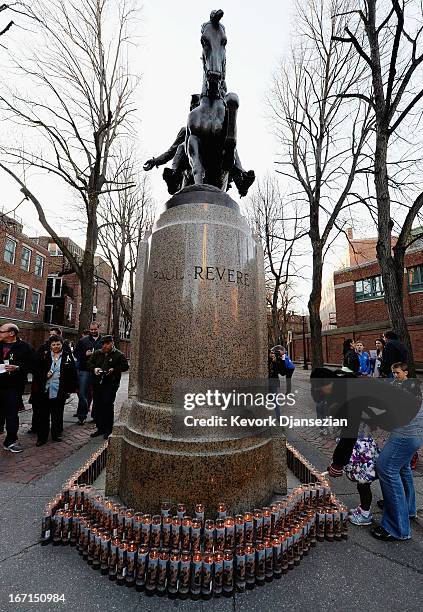 People participate in a candelight vigil for victims of Boston Marathon bombings on April 21, 2013 in Boston, Massachusetts. A manhunt for Dzhokhar...