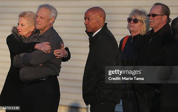 People wait on line to attend the wake for 29-year-old Krystle Campbell who was one of three people killed in the Boston Marathon bombings on April...