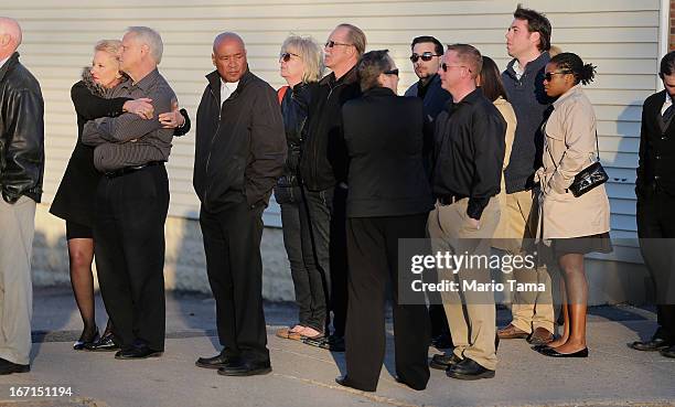 People wait on line to attend the wake for 29-year-old Krystle Campbell who was one of three people killed in the Boston Marathon bombings on April...