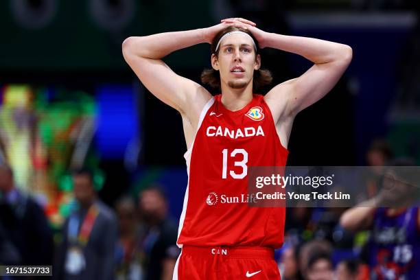 Kelly Olynyk of Canada reacts after missing a shot to end the fourth quarter during the FIBA Basketball World Cup 3rd Place game against the United...