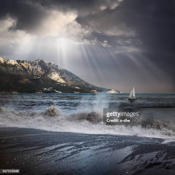a view of the sea being covered by gray clouds and a storm - sea ​​of ​​clouds stock pictures, royalty-free photos & images