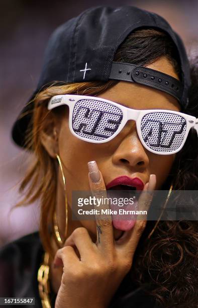 Rihanna attends game 1 of the Eastern Conference Quarterfinals of the 2013 NBA Playoffs between the Miami Heat and the Milwaukee Bucks at American...