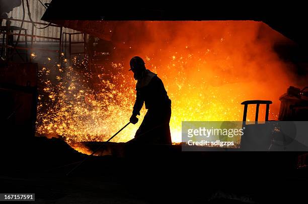 the worker in front of blast furnace - blast furnace stock pictures, royalty-free photos & images