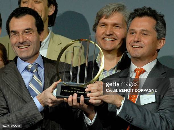 Co-founders and directors of EXKi Nicolas Steisel and Frederic Rouvez handel their award at the of the 15th edition of the Enterprise of the year...