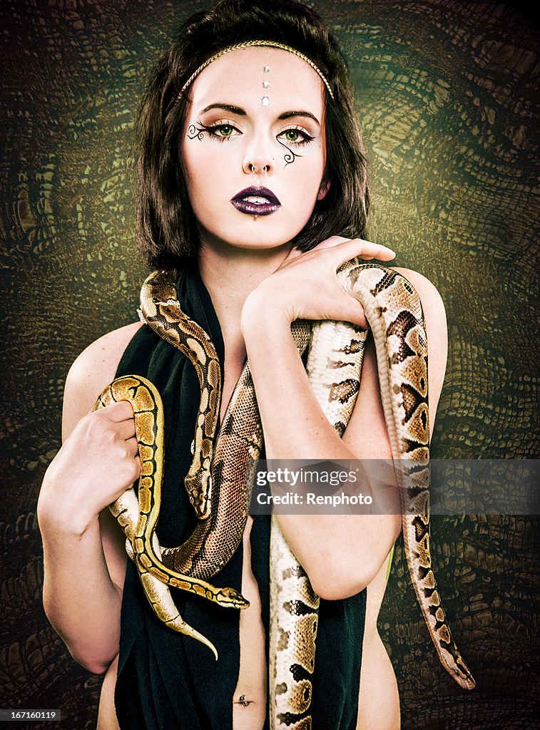 New Age: Spirtitual Woman Holding Snakes