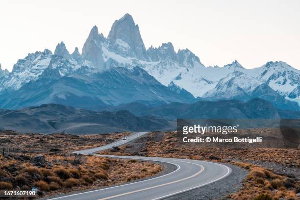car driving at sunset in el chalten, argentina - santa cruz province argentina stock pictures, royalty-free photos & images