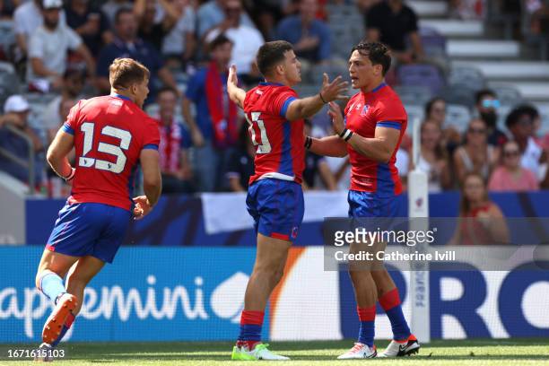 Rodrigo Fernandez of Chile celebrates scoring his team's first try with Santiago Videla of Chile during the Rugby World Cup France 2023 match between...