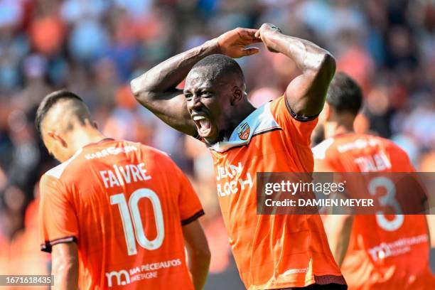 Lorient's French defender Benjamin Mendy reacts after his team's second goal by Lorient's French midfielder Romain Faivre during the French L1...