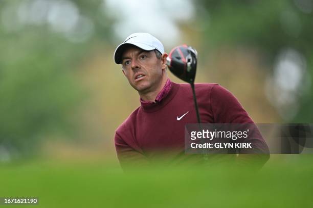Northern Ireland's Rory McIlroy watches his drive from the 17th tee on day four of the BMW PGA Championship at Wentworth Golf Club, south-west of...