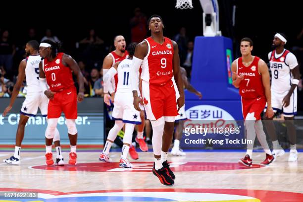 Barrett of Canada celebrates after scoring a three-pointer in overtime during the FIBA Basketball World Cup 3rd Place game against the United States...
