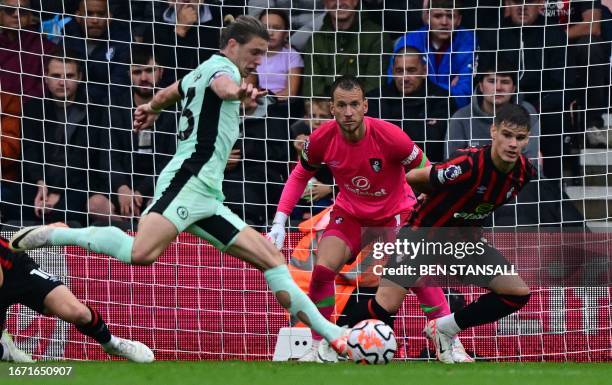 Bournemouth's Brazilian goalkeeper Neto watches before saving a shot from Chelsea's English midfielder Conor Gallagher during the English Premier...