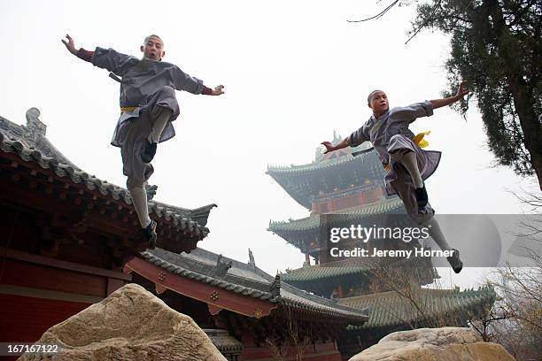 Shaolin Monastery or Shaolin Temple, a Chan Buddhist temple on Mount Song, near Dengfeng, Zhengzhou, Henan province, China Shaolin monks train in...