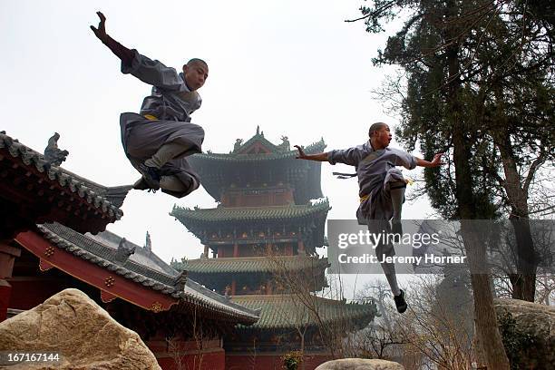 Shaolin Monastery or Shaolin Temple, a Chan Buddhist temple on Mount Song, near Dengfeng, Zhengzhou, Henan province, China Shaolin monks train in...