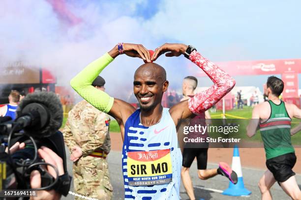 Sir Mo Farah of Great Britain celebrates after the Elite Men race during the AJ Bell Great North Run 2023 on September 10, 2023 in Newcastle upon...