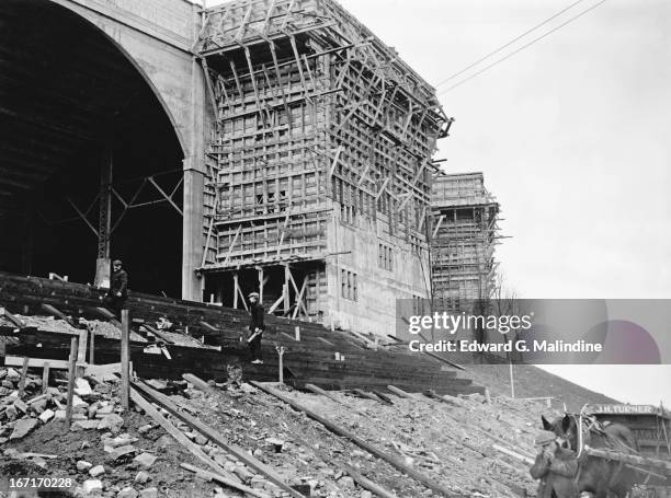 Construction is under way on the two towers at Wembley Stadium, 14th February 1924. Stairways are being built within the towers to enable latecomers...