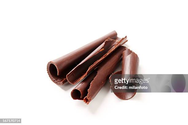 riccioli di cioccolato isolati su bianco - chocolate swirls foto e immagini stock