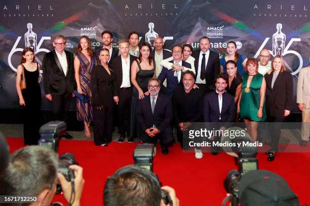 Eugenio Caballero and Alejandro González Iñárritu and talent of 'Bardo' movie pose for photo during the 65th Ariel Awards presented by the Mexican...