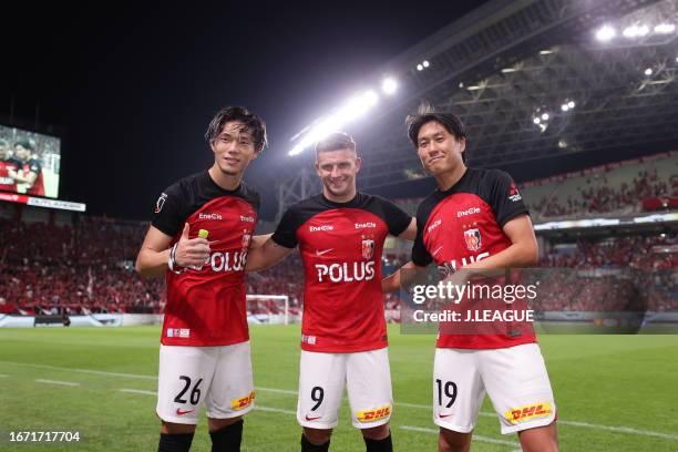 Of Urawa Reds players applaud fans after during the J.LEAGUE YBC Levain Cup quarter final second leg match between Urawa Red Diamonds and Gamba Osaka...
